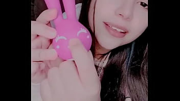 A shy girl indulges in solo play with a bunny vibrator